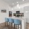 a kitchen with white cabinets