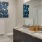 a bathroom with a large mirror