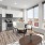 a kitchen with a table and chairs