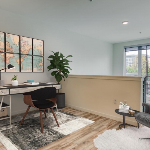 a open office with a table and chairs