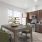 a kitchen with a table and chairs